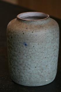 A blue and green ceramic vase