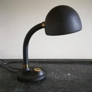 A dark brown desk lamp 