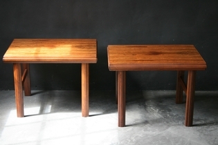 A pair of scandinavian palissander bedside tables