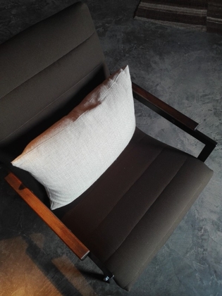 A Pierre Guariche lounge chair, newly upholsterd