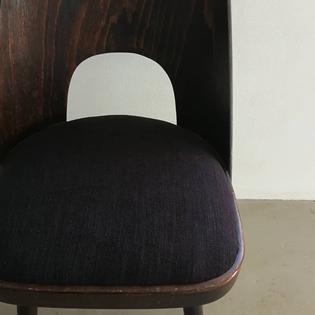 A set of 4 dining chairs, newly upholsterd, by Oswald Haerdtl