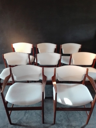 a set of 8 diningchairs by Kofod Larsen comprising two armchairs and 6 chairs, newly recoverd with white coton