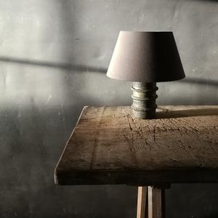 A small ceramic table lamp