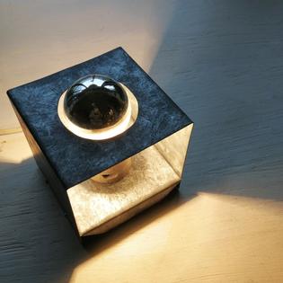 A small zinc cube tablelamp
