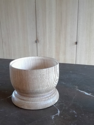 An oak wooden and turned bowl