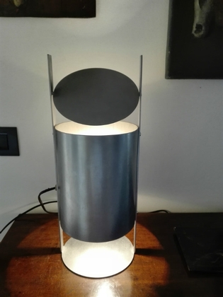 An unusual metal table lamp