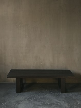 Black wooden slated bench or coffeetable