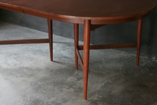 Dining table by Arne Vodder with two extensions