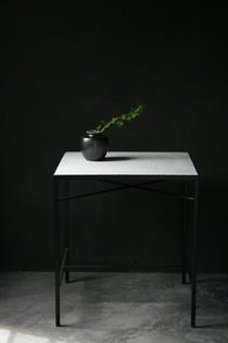 Modern table with black metal structure