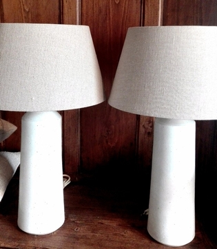 Pair of white ceramic tablelamps and shades