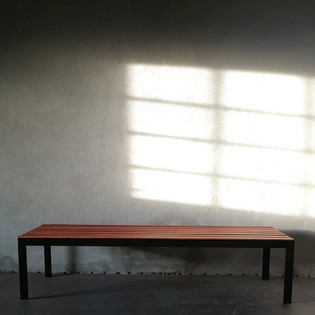 Slated teak and black metal bench or coffeetable by Florence Knoll, 50s
