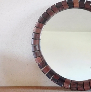 Small unusual rosewood mirror